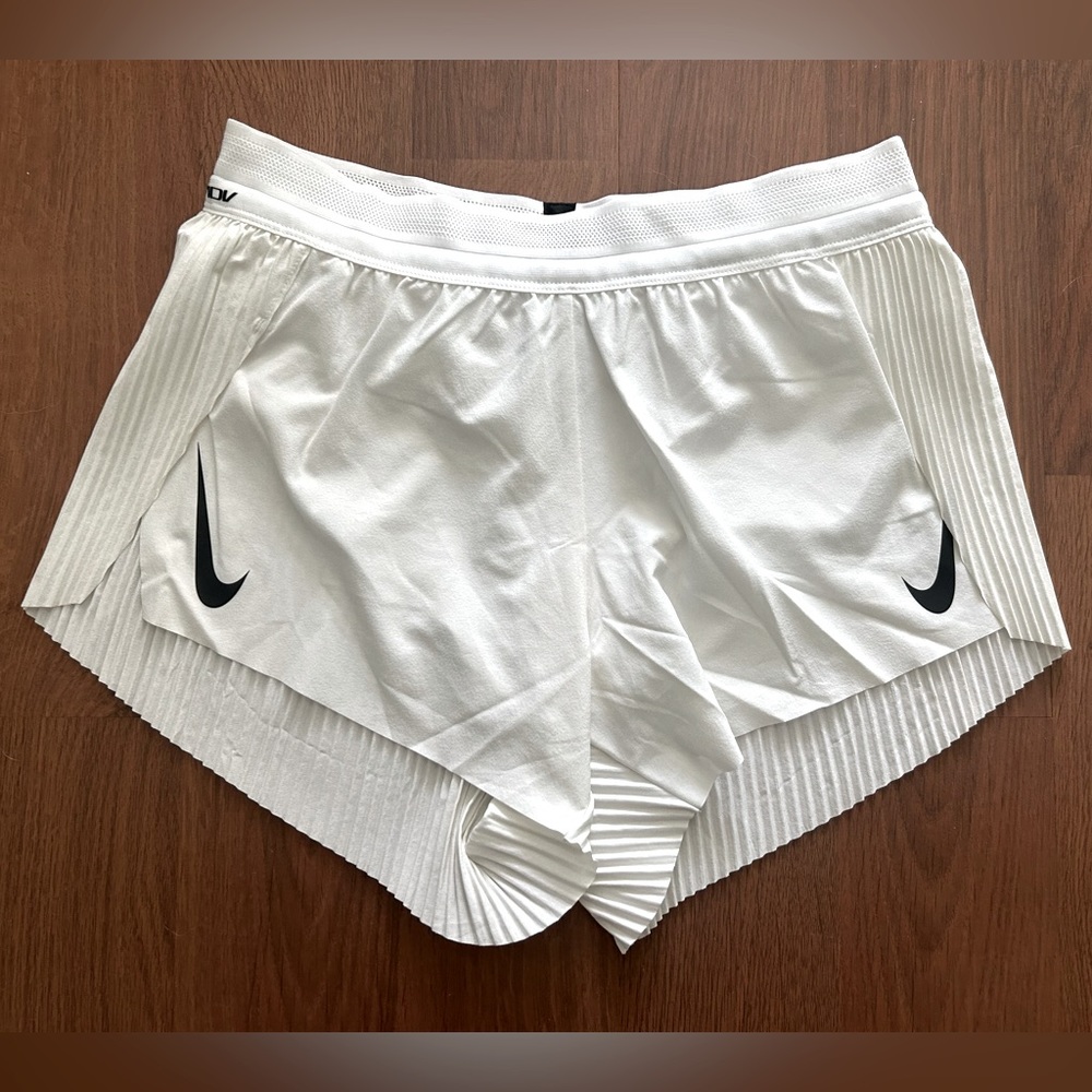 Nike White Athletic Running Shorts with Black Swoosh